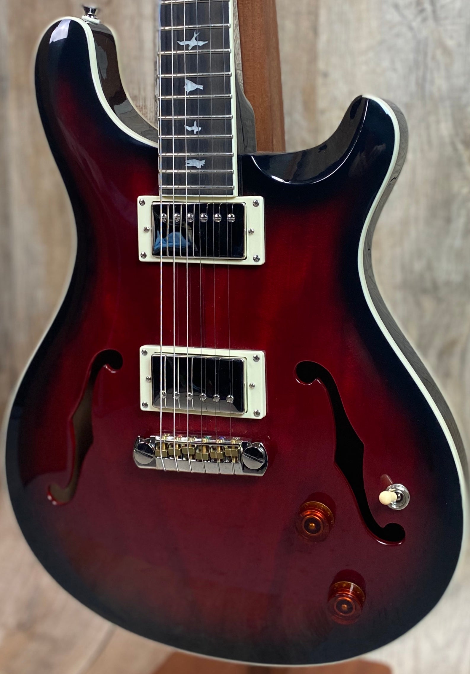 Front right angle of Open Box PRS Paul Reed Smith SE Hollowbody Standard Fire Red Burst.