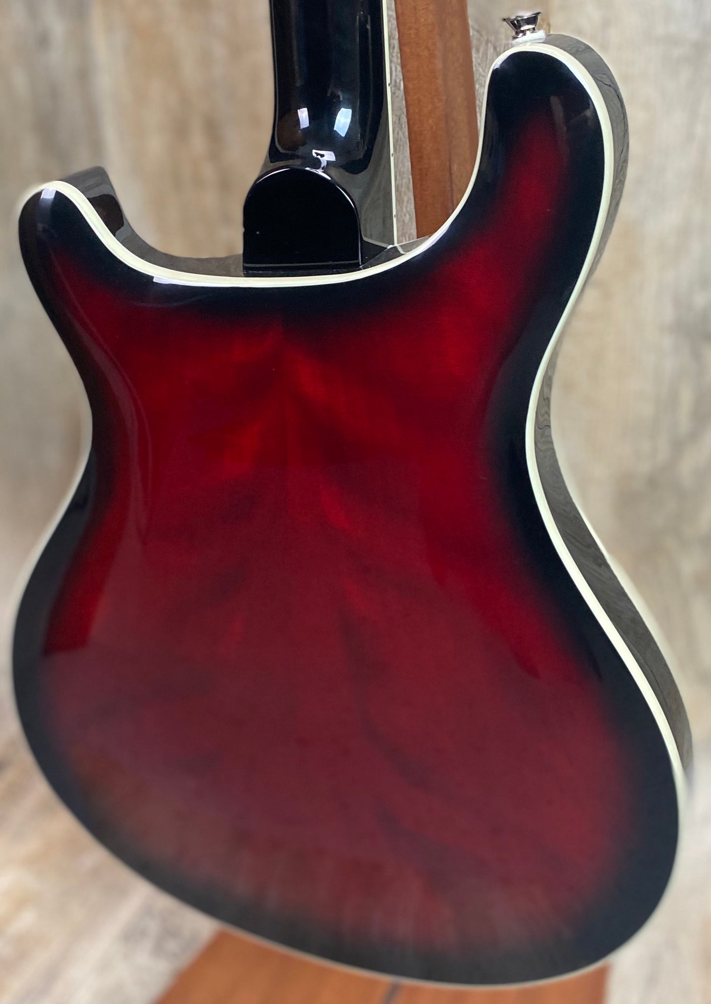 Back left angle of Open Box PRS Paul Reed Smith SE Hollowbody Standard Fire Red Burst.