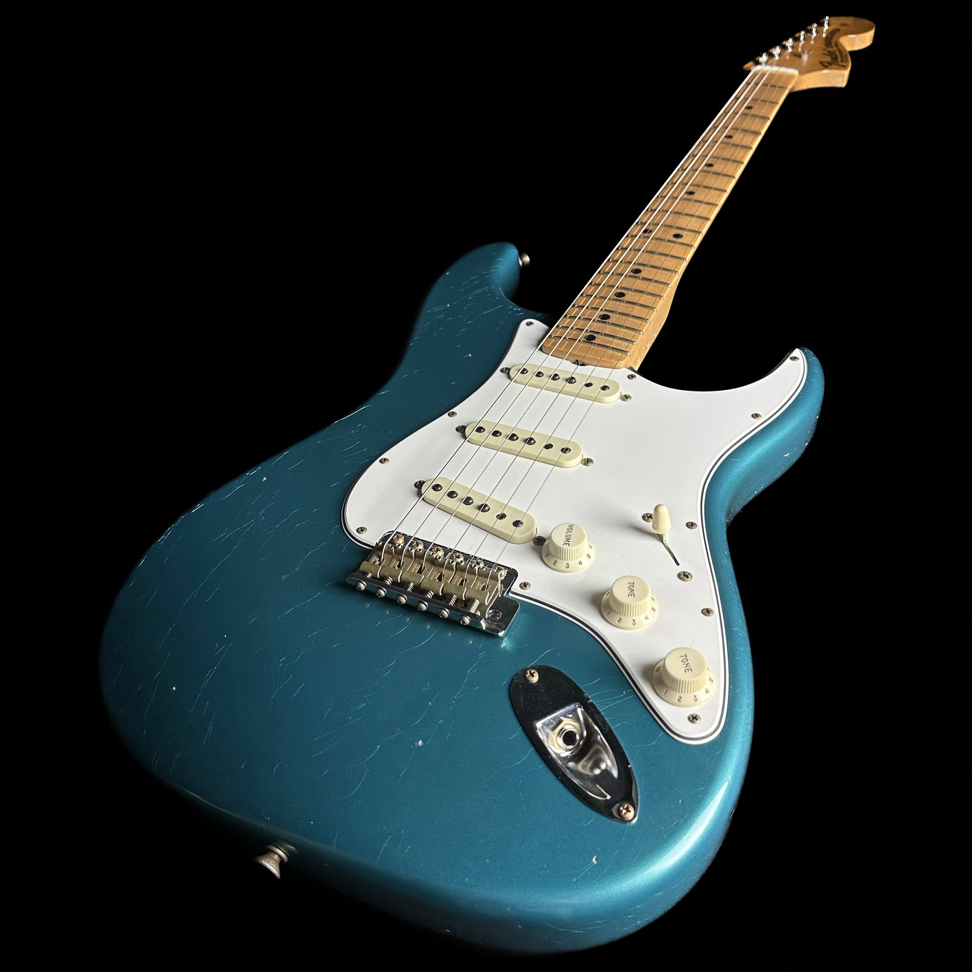 Front angle of Fender Custom Shop Limited Edition '68 Strat Journeyman Relic Aged Ocean Turquoise.
