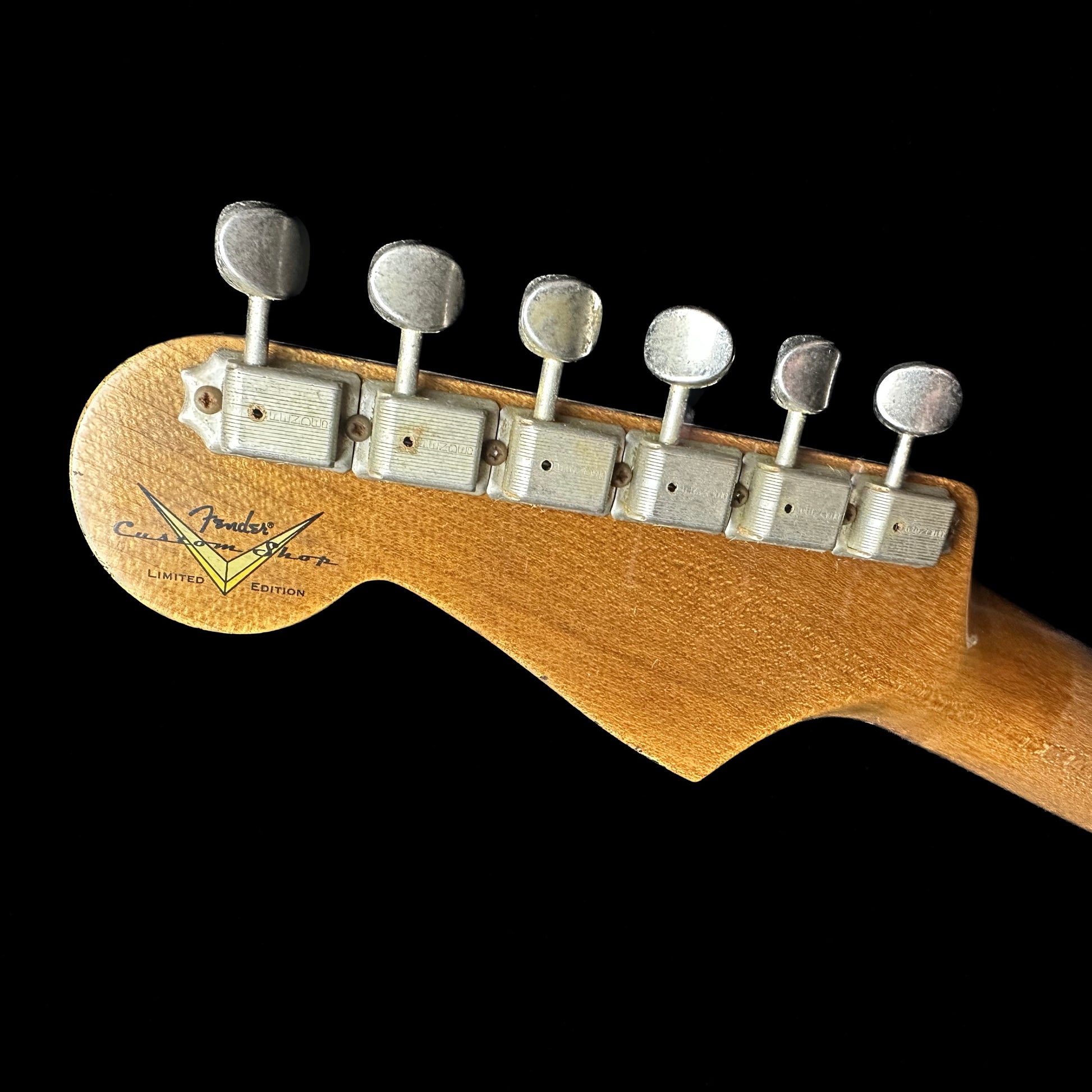 Back of Fender Custom Shop Limited 61 Strat Heavy Relic Faded Aged Sonic Blue/3-Tone Sunburst headstock.
