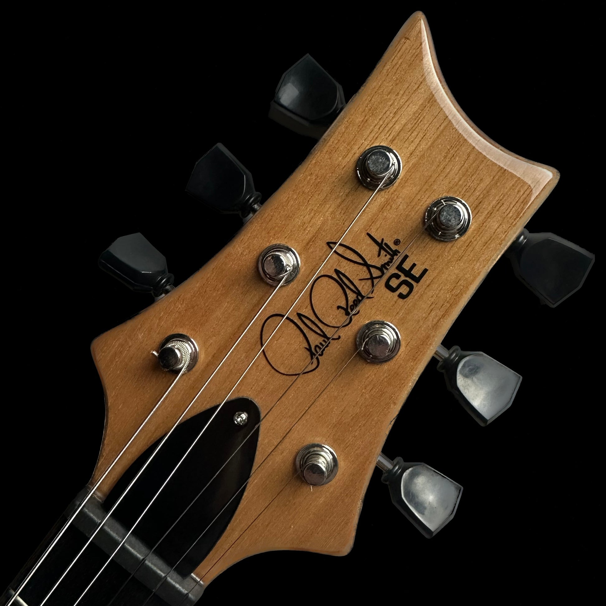 Headstock of PRS Paul Reed Smith SE Paul's Guitar Faded Blue Burst.