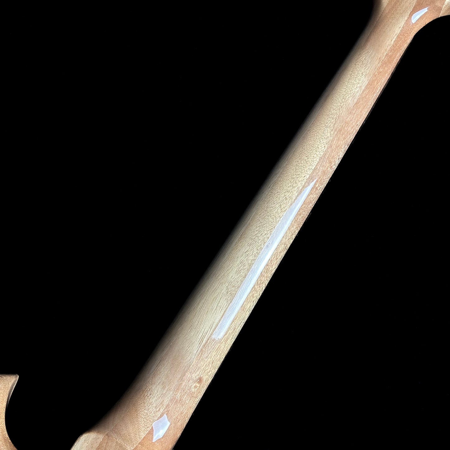 Back of neck of PRS Paul Reed Smith SE Paul's Guitar Faded Blue Burst.