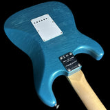 Back angle of Fender Custom Shop Limited Edition '68 Strat Journeyman Relic Aged Ocean Turquoise.