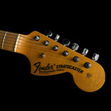 Closeup of Fender Custom Shop Limited Edition '68 Strat Journeyman Relic Aged Ocean Turquoise headstock.