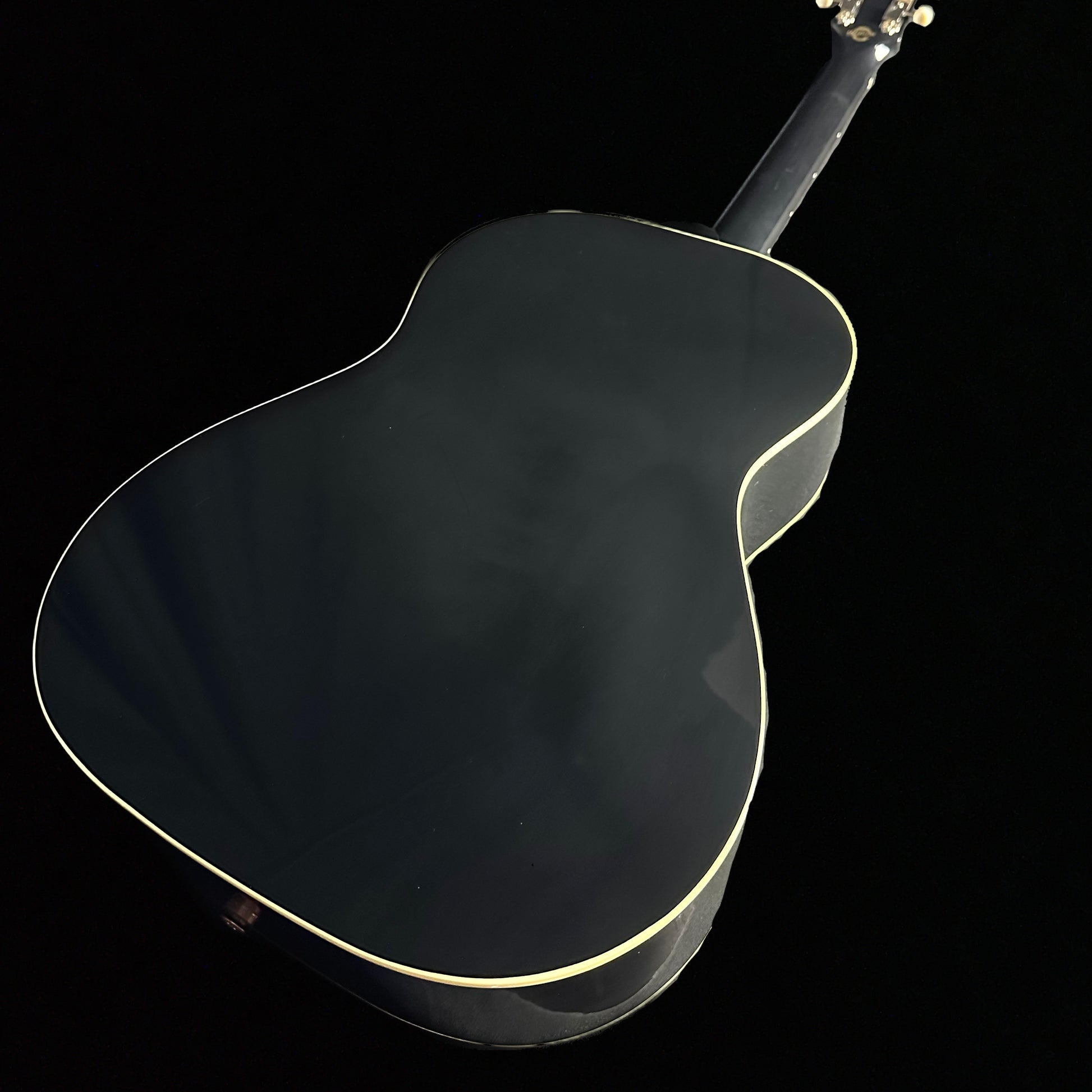 Bottom right angle of Gibson Custom Shop M2M 50's LG-2 Ebony back.