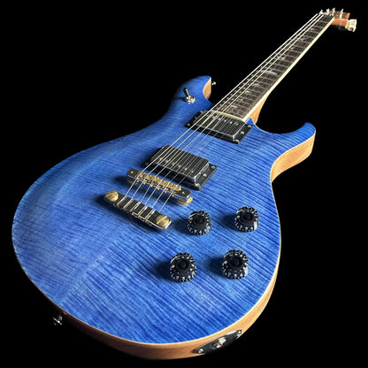 Bottom right angle of PRS Paul Reed Smith SE McCarty 594 Faded Blue.