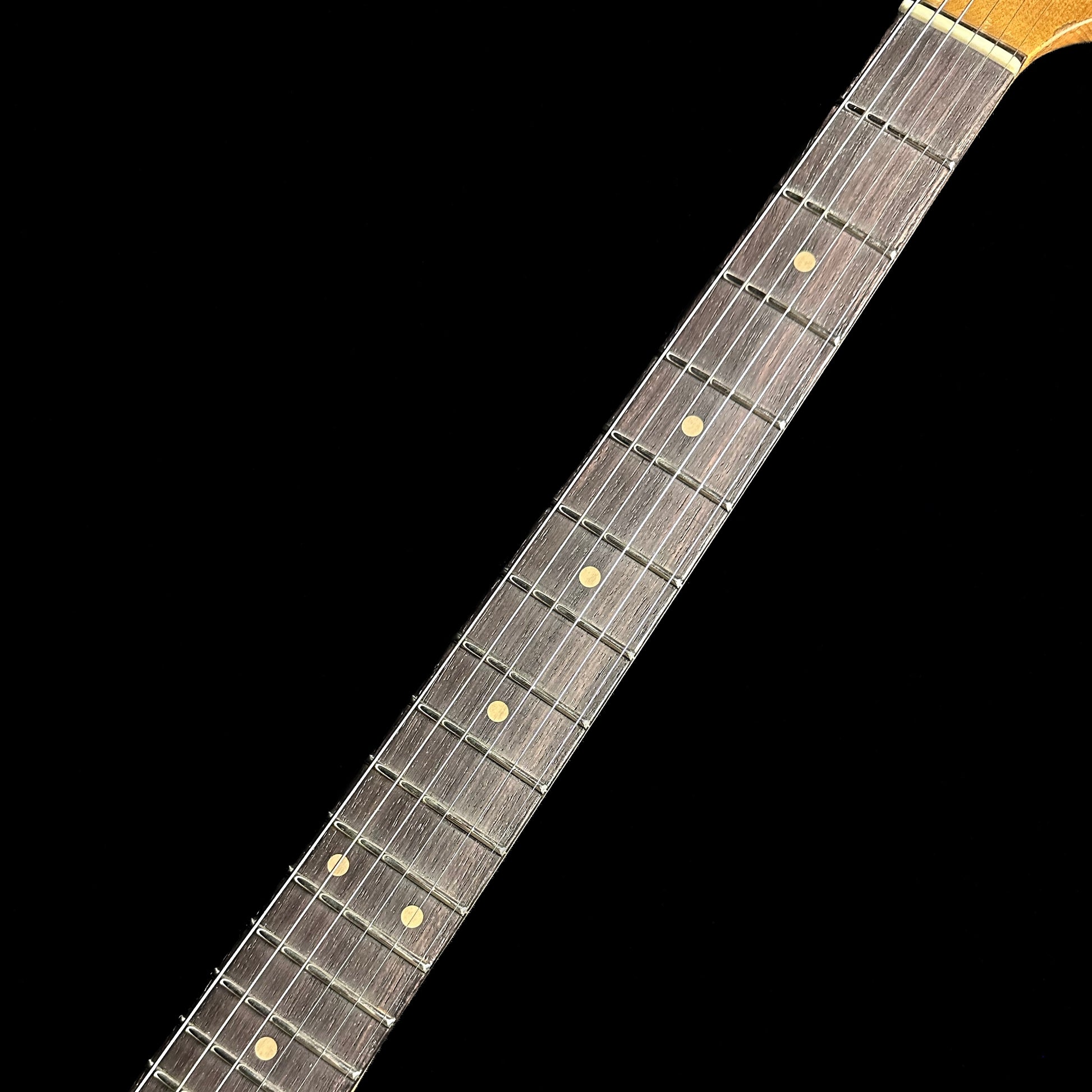 Fretboard of Fender Custom Shop Limited Edition Poblano Stratocaster Super Heavy Relic Aged Black.