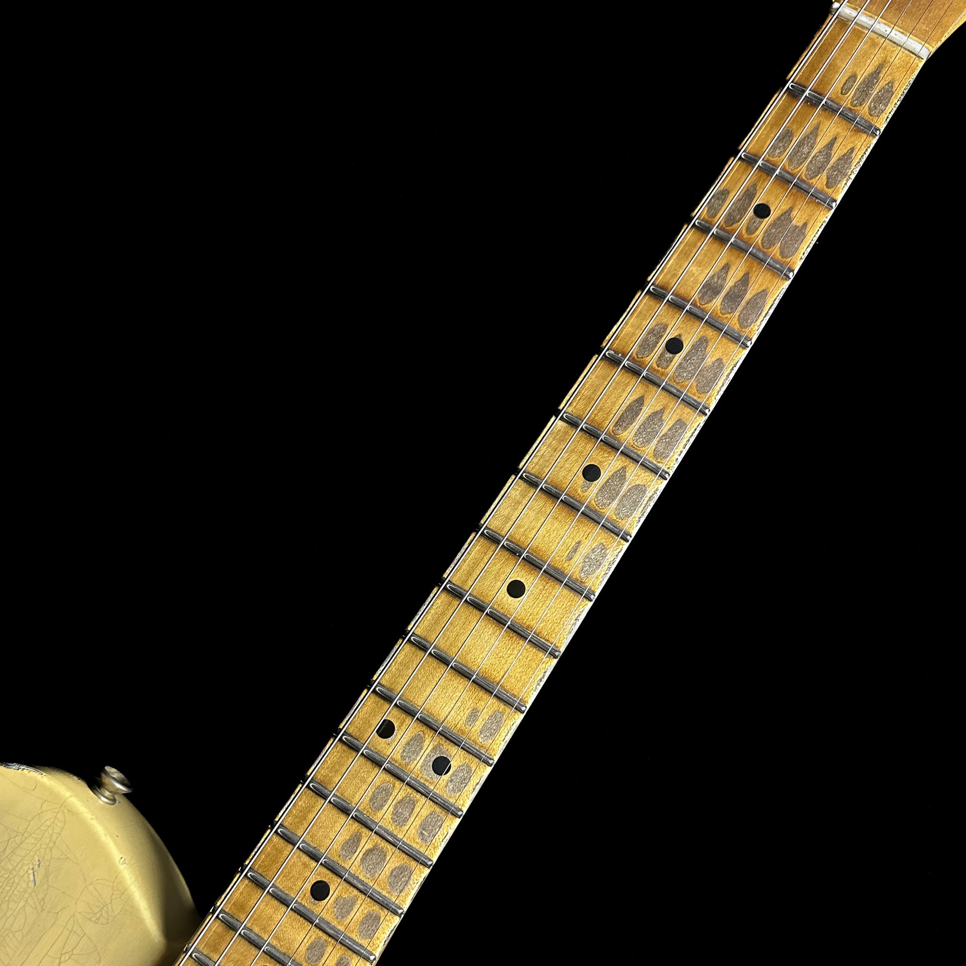 Closeup of Fender Custom Shop '52 Telecaster Heavy Relic Maple Neck Aged Nocaster Blonde fretboard.
