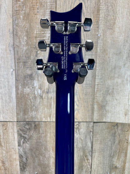 Back of PRS Paul Reed Smith SE Standard 24-08 Translucent Blue neck and headstock.