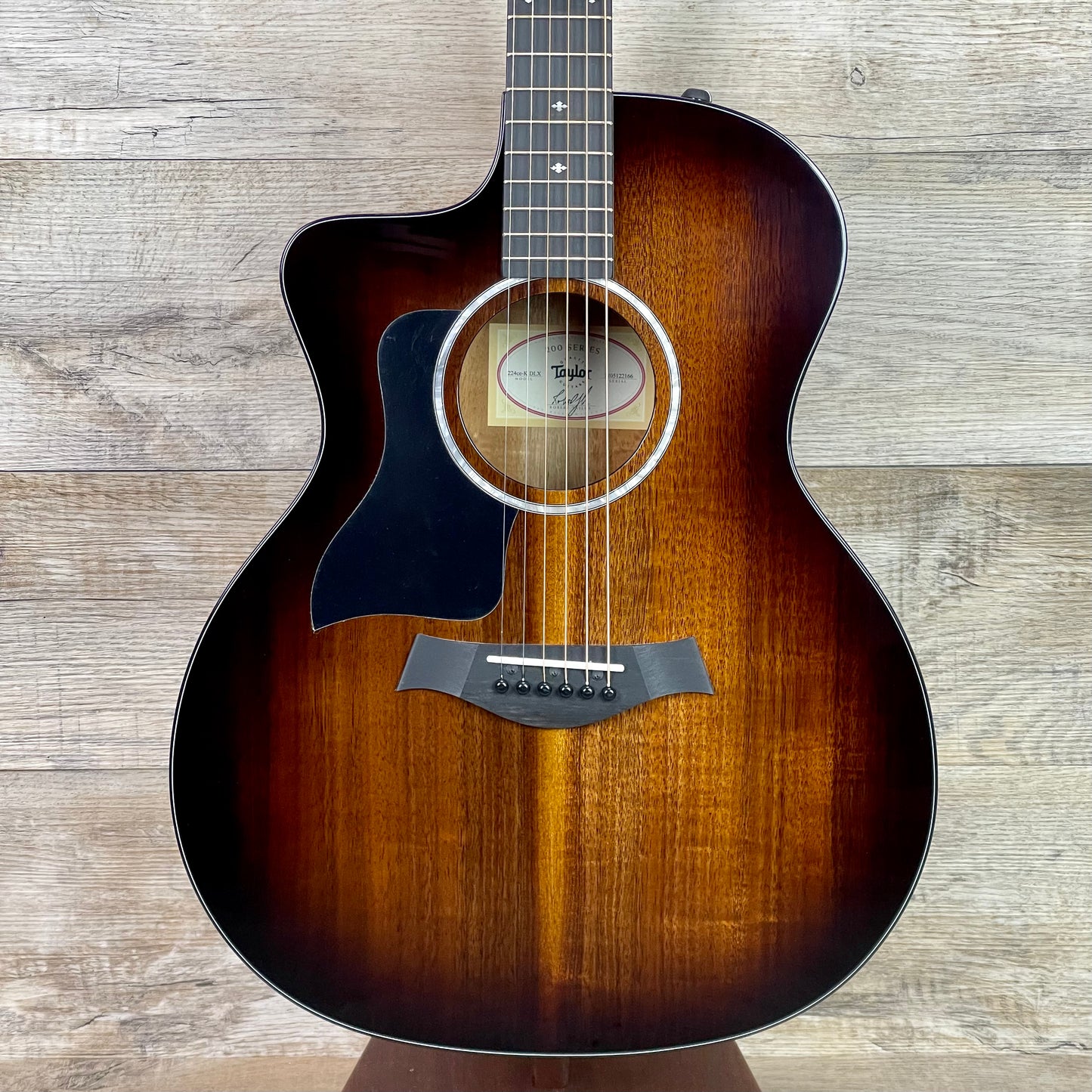Front of Taylor 224ce-K DLX Shaded Edgeburst Left Hand.