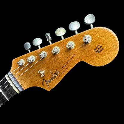 Close up of Fender Custom Shop Limited 61 Strat Heavy Relic Faded Aged Sonic Blue/3-Tone Sunburst headstock.