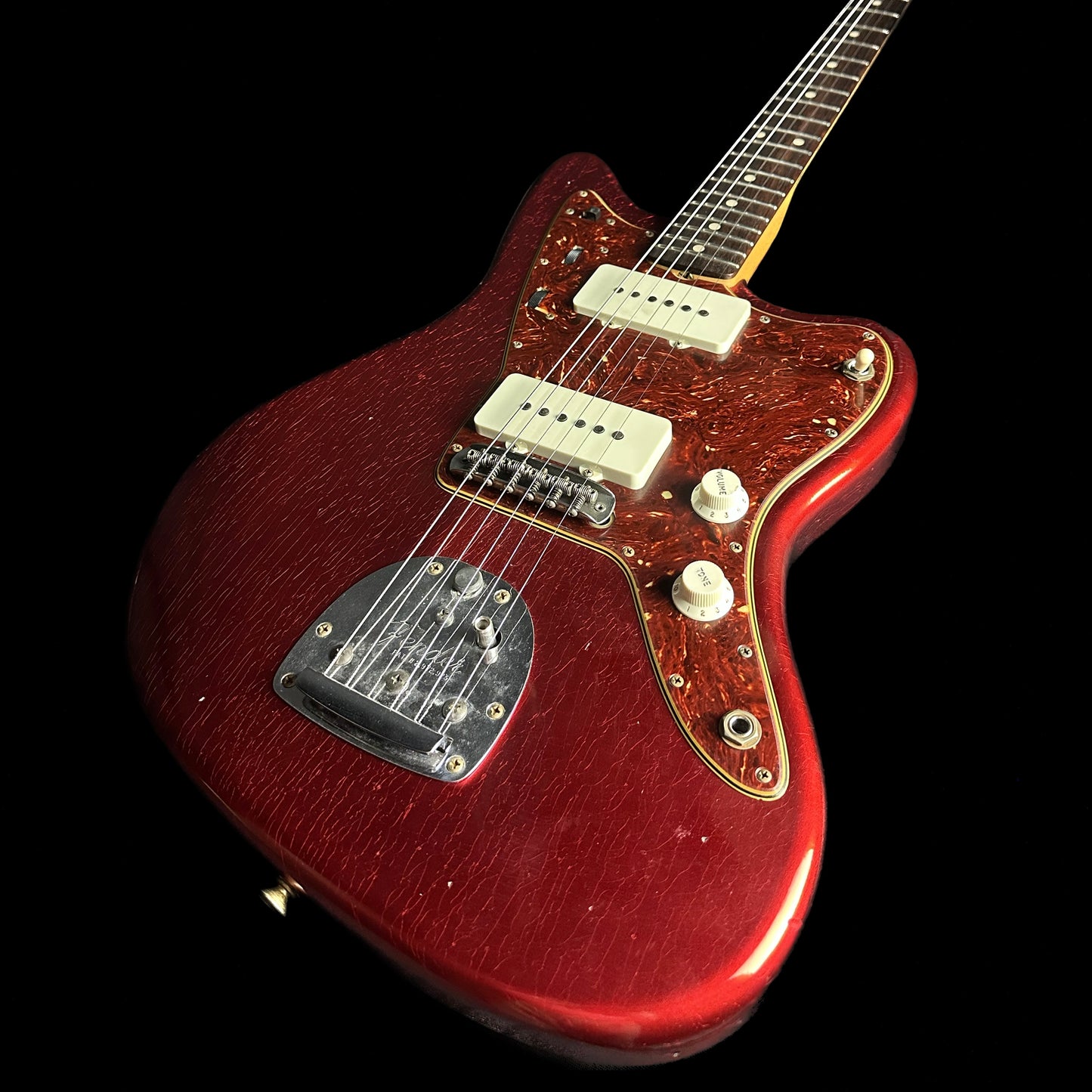 Front angle of Fender Custom Shop 1962 Jazzmaster Journeyman Relic Aged Candy Apple Red Reverse Headstock.