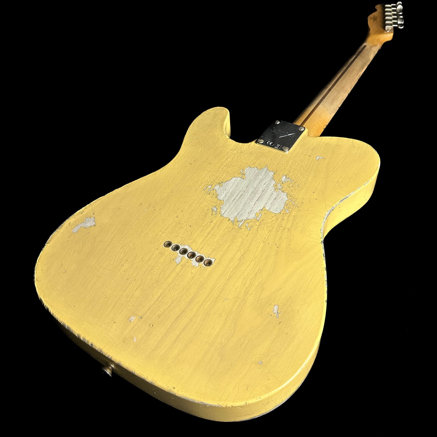 Back angle of Fender Custom Shop '52 Telecaster Heavy Relic Maple Neck Aged Nocaster Blonde.