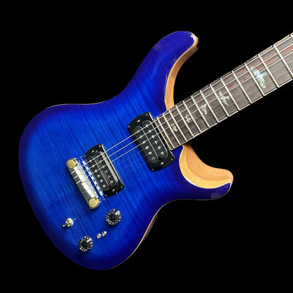 Front angle of PRS Paul Reed Smith SE Paul's Guitar Faded Blue Burst.