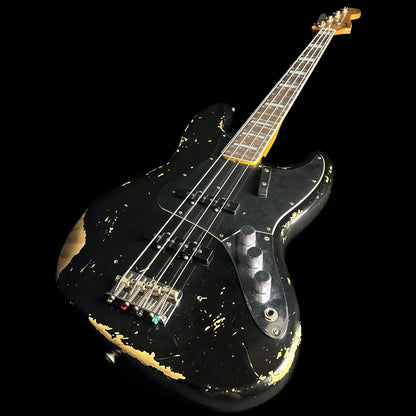 Front angle of Fender Custom Shop Limited Edition Custom Jazz Bass Heavy Relic Aged Black.