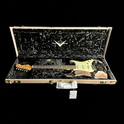 Left angle of Fender Custom Shop Limited 1960 Dual Mag II Stratocaster Super Heavy Relic Aged Black in case.