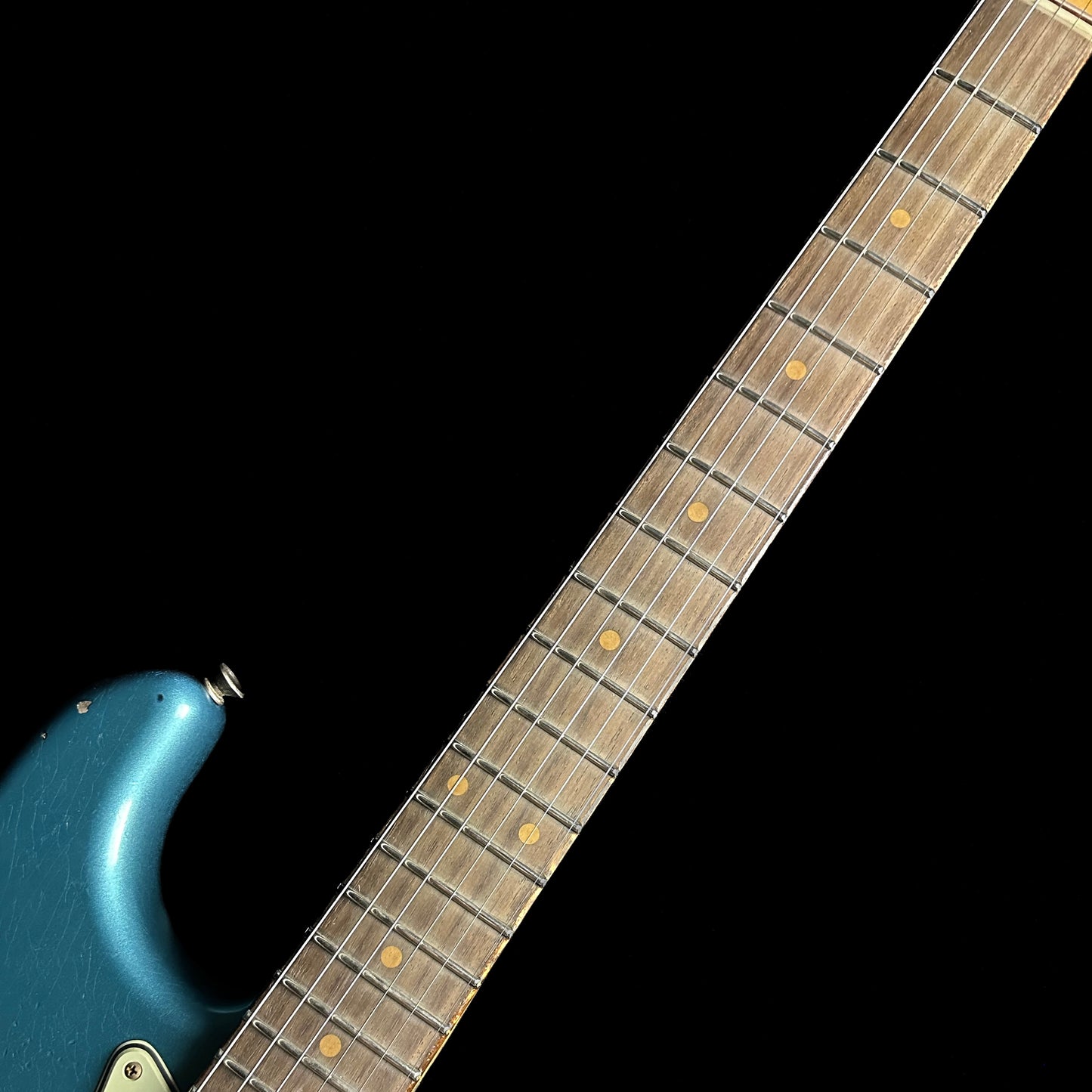 Close up of Fender Custom Shop 1961 Heavy Relic Stratocaster Aged Ocean Turqouise /3 Tone Sunburst neck.