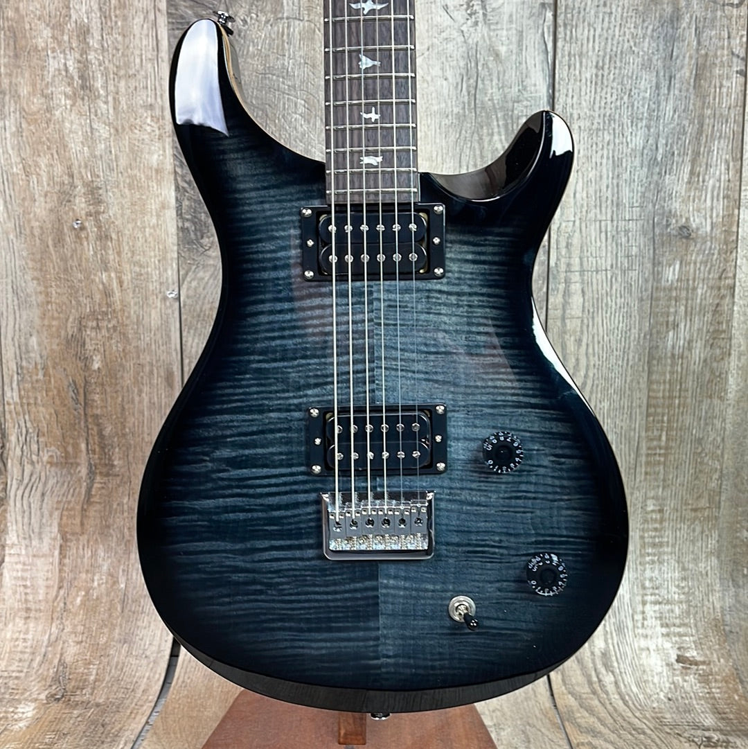 Front of PRS Paul Reed Smith SE 277 Baritone Charcoal Burst.