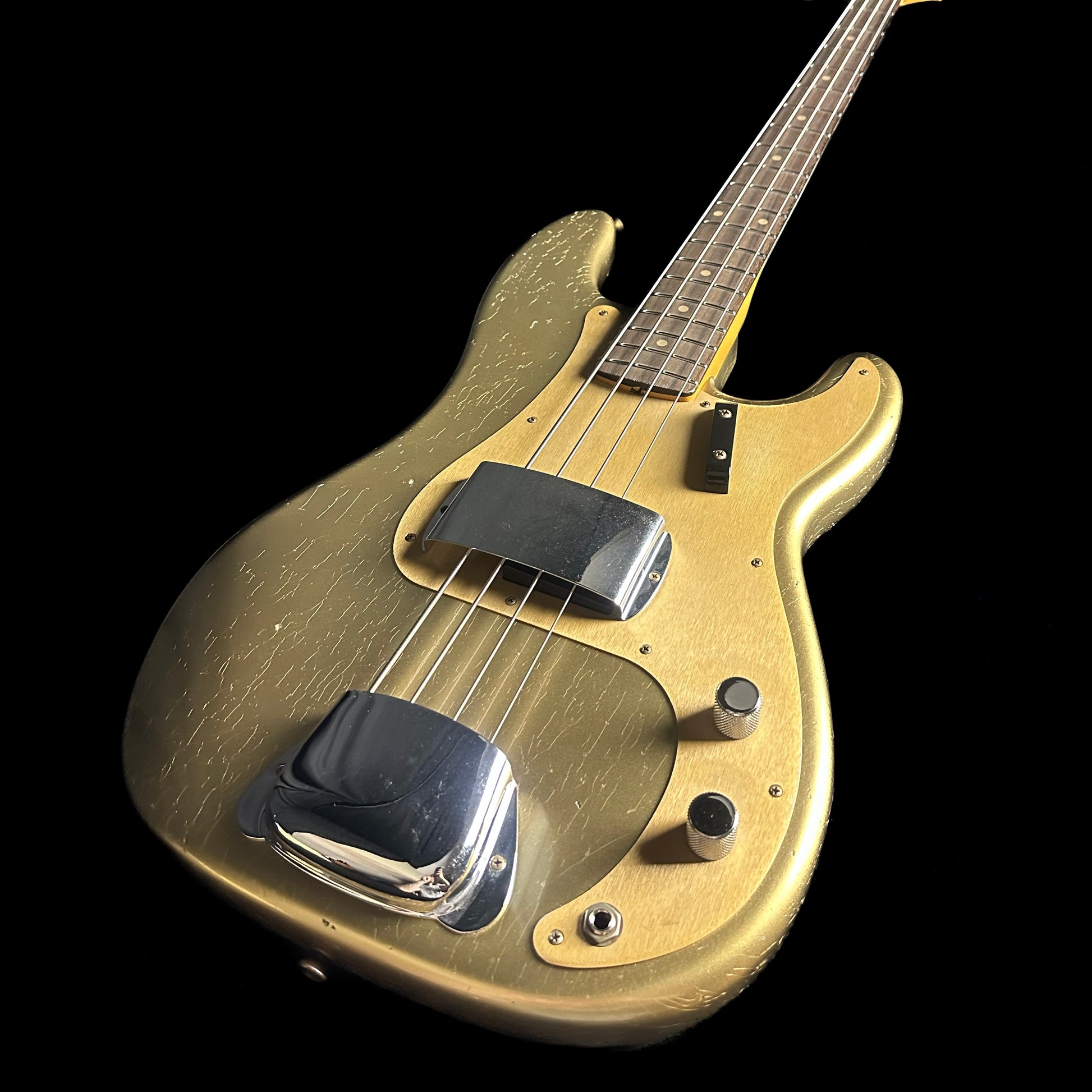 Front angle of Fender Custom Shop Limited Edition '59 Precision Bass Journeyman Relic HLE Gold.