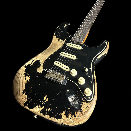Front angle of Fender Custom Shop Limited Edition Poblano Stratocaster Super Heavy Relic Aged Black.