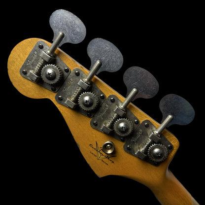 Back of Fender Custom Shop Limited Edition Custom Jazz Bass Heavy Relic Aged Black headstock.