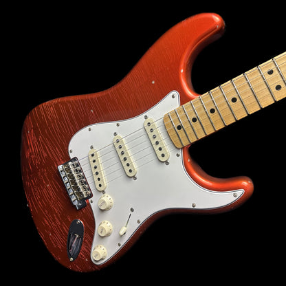 Front angle of Fender Custom Shop Limited Edition '69 Strat Journeyman Relic Aged Candy Tangerine.
