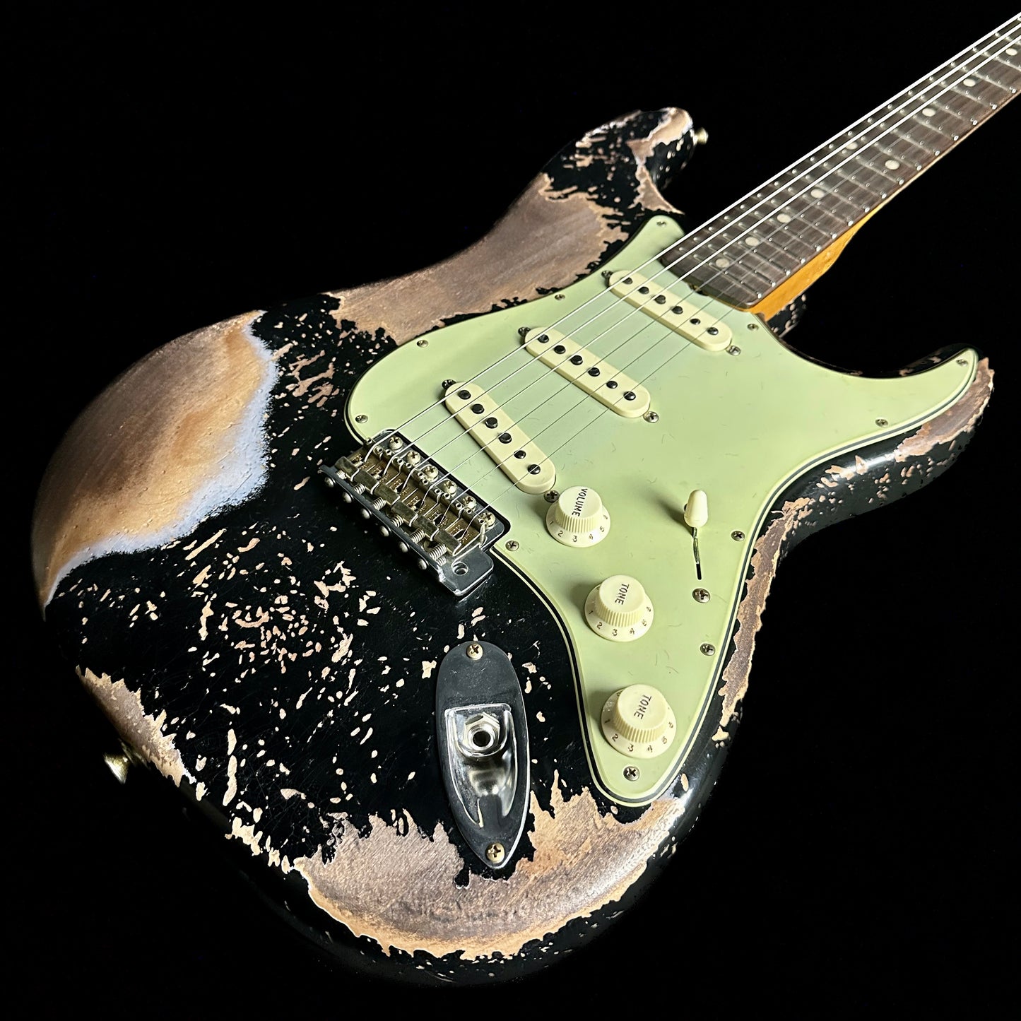 Front angle of Fender Custom Shop Limited 1960 Dual Mag II Stratocaster Super Heavy Relic Aged Black.