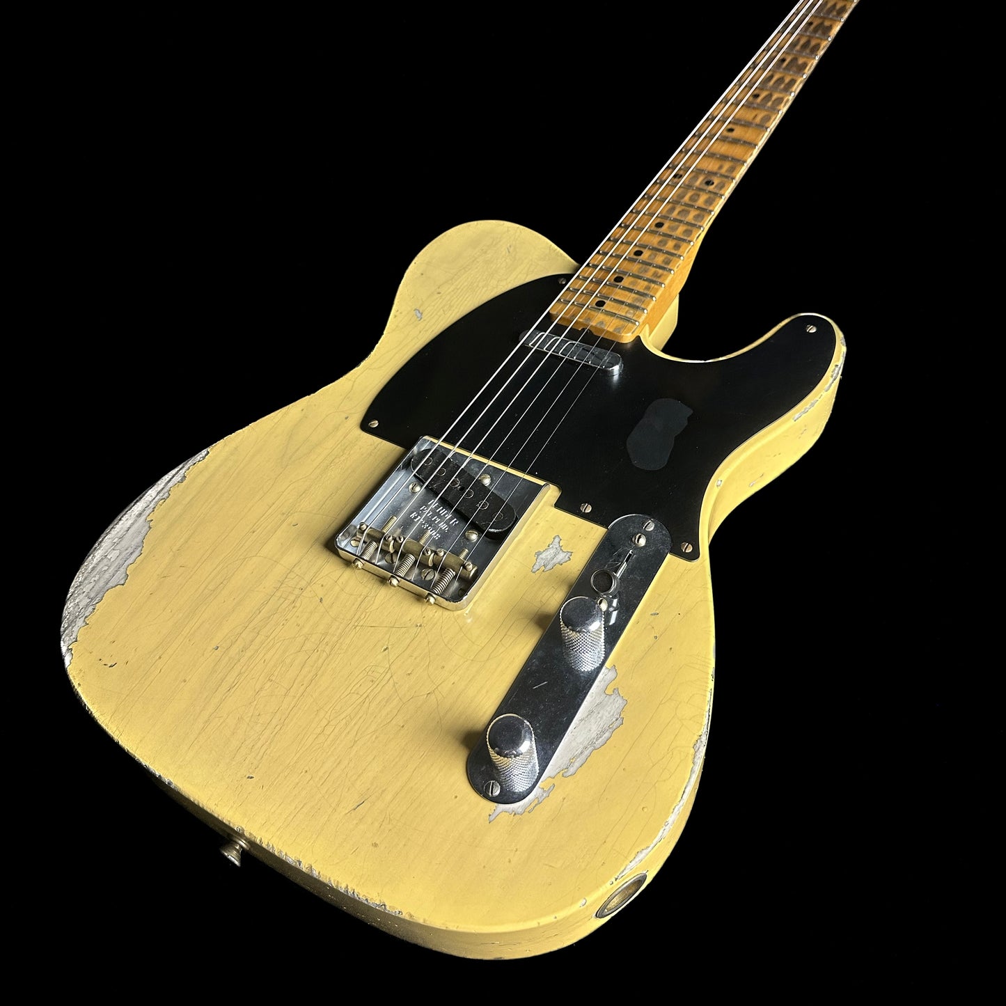 Front angle of Fender Custom Shop '52 Telecaster Heavy Relic Maple Neck Aged Nocaster Blonde.