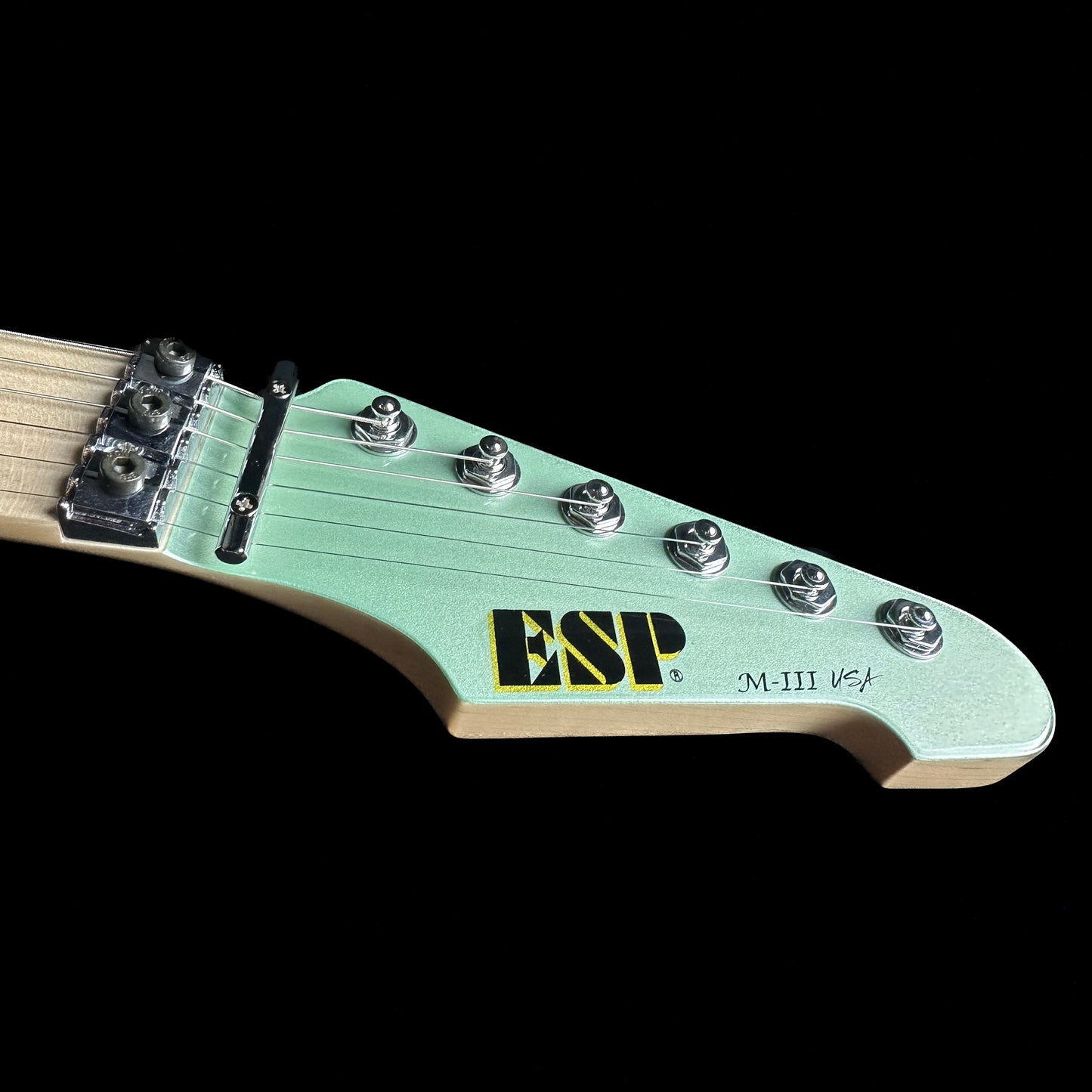 Headstock of ESP USA M-III Floyd Rose Oasis Green.