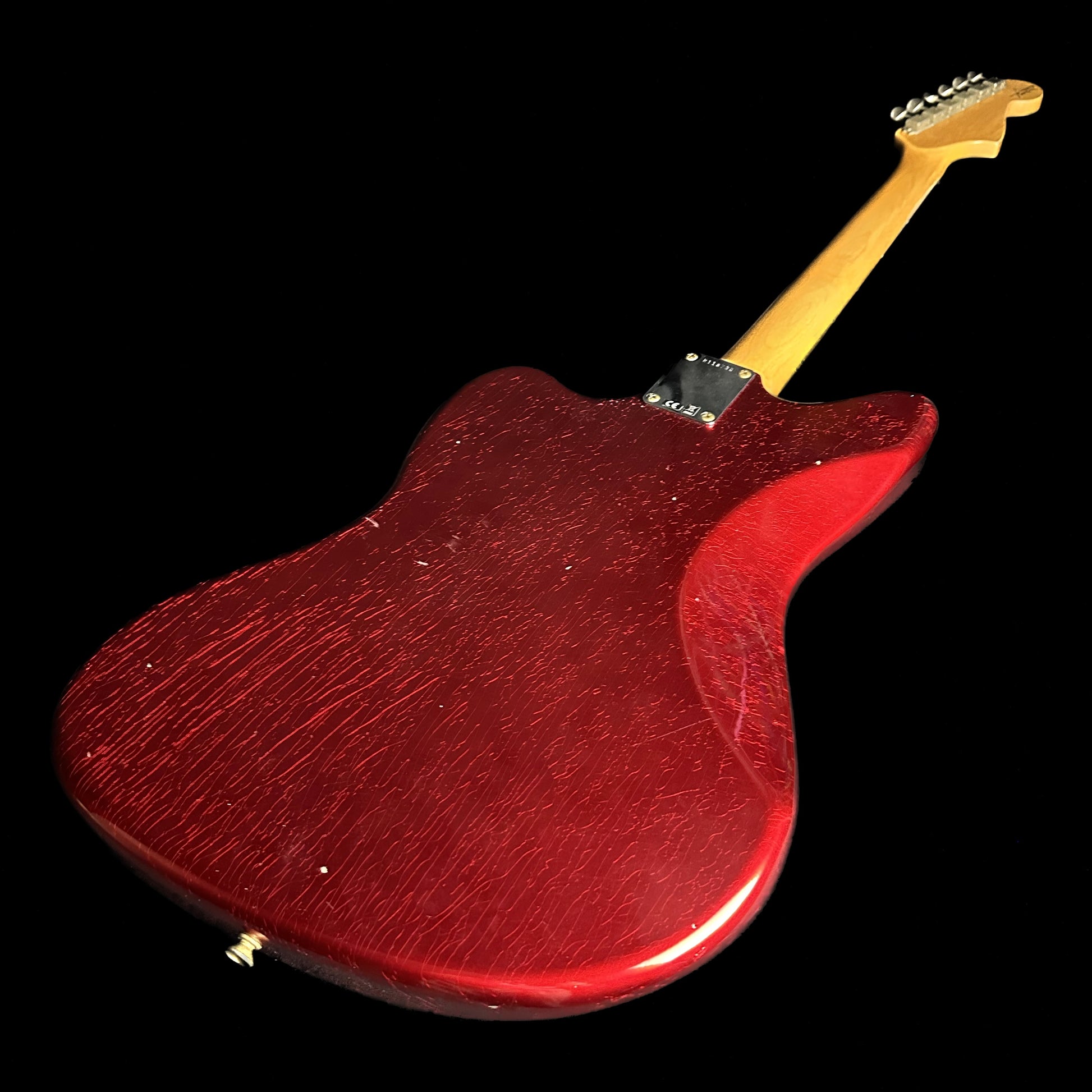 Back angle of Fender Custom Shop 1962 Jazzmaster Journeyman Relic Aged Candy Apple Red Reverse Headstock.